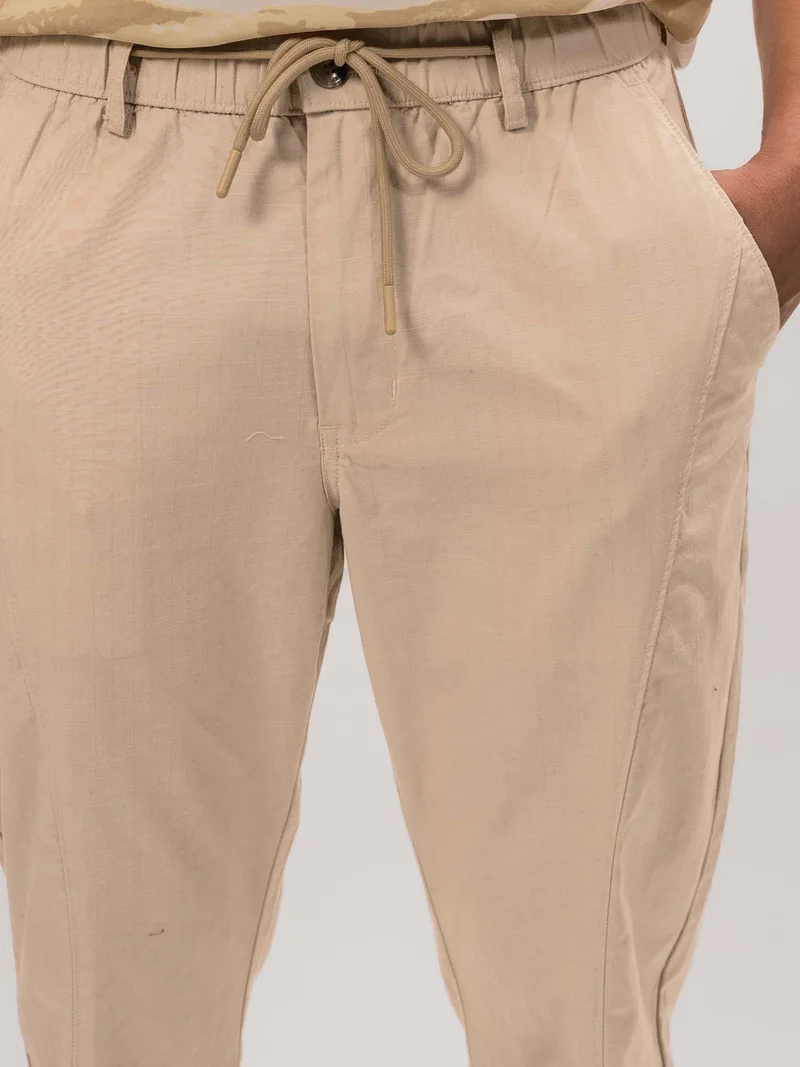 Maniac  Maniac Mens Cut and Sew Solid Light Beige Cotton Trackpant for Men | Best Price UAE